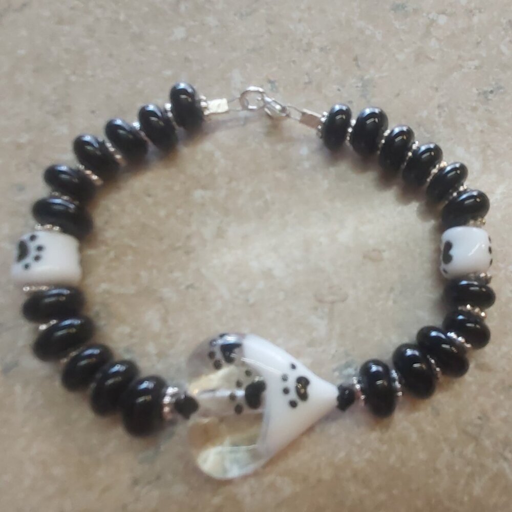 Handmade pawprint lampwork glass beaded bracelet with sterling clasp